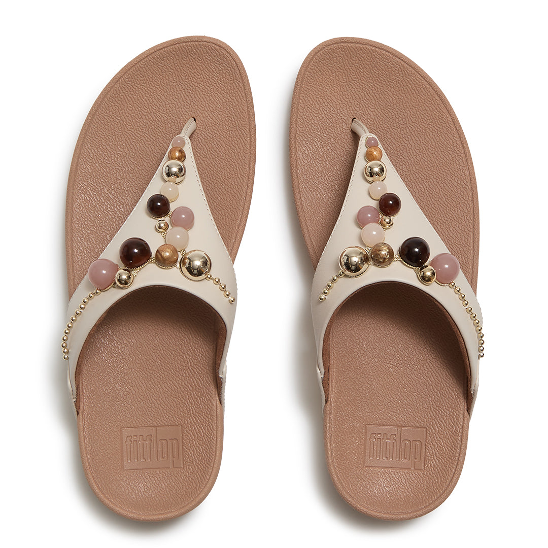 Top view of FitFlop LULU Beaded Toe-Post Sandals highlighting the toe-post design, triangular vamp, tonal beads and contoured footbed.