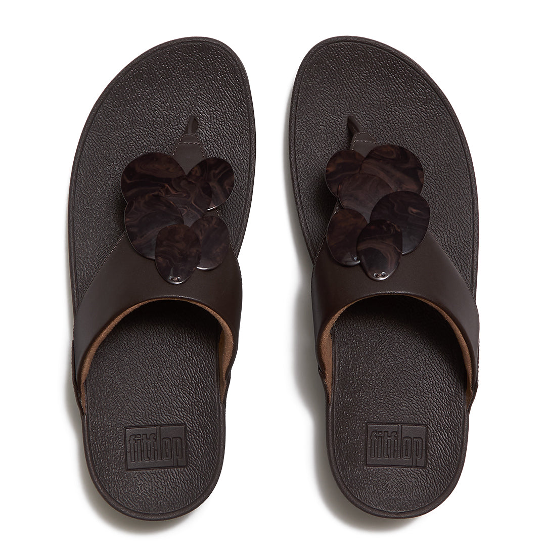 Top view of FitFlop LULU Disc-Cluster Toe-Post Sandals highlighting the triangular vamp, toe-post design, marble-effect discs and contoured footbed.