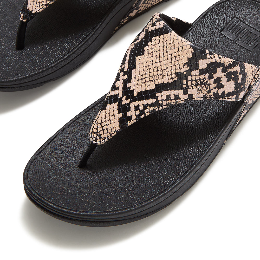 Close-up of FitFlop LULU Snake Toe-Post Sandals showcasing the soft leather and textured snake-effect embossing.