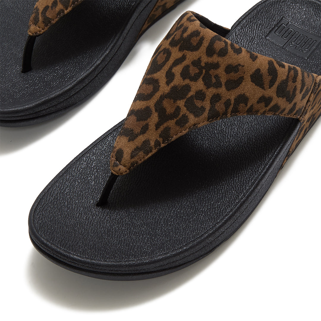 Close-up of FitFlop LULU Suede Leopard Toe-Post Sandals showcasing the soft suede texture and leopard-print detailing.