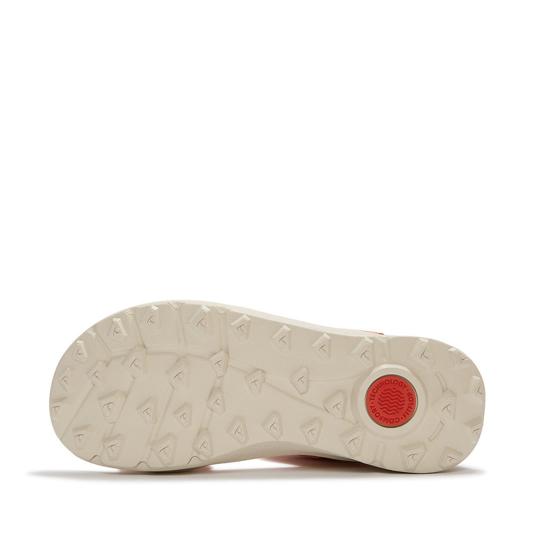 Outsole of FitFlop NEO-D-HYKER Outdoor Sandals featuring a triangular tread pattern for enhanced grip on trails, mud, and uneven surfaces.