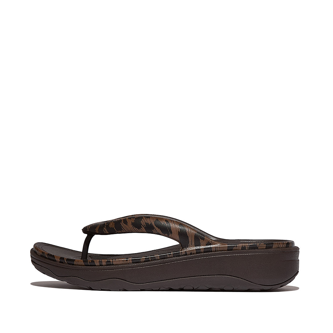 Side view of FitFlop RELIEFF Leopard Recovery Toe-Post Sandals showcasing leopard-print detailing and ergonomic Microwobbleboard™ cushioning.