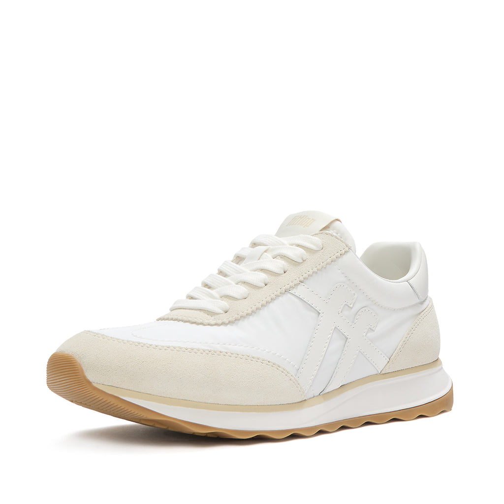 Side view of FitFlop RETRO-Q FF Fabric/Suede Sneakers showcasing suede overlays, nylon construction, and ergonomic iQushion™ cushioning.